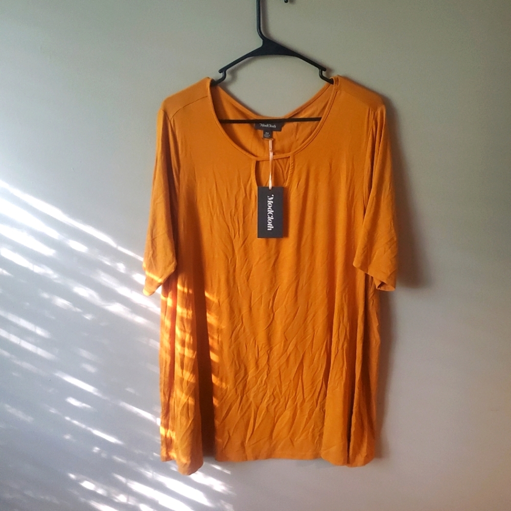 mustard yellow shirt